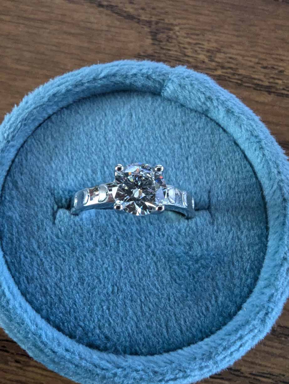 The proposal ring featured a custom moon cycle design created by Adam and a friend from the Graphic Design program we both attended.